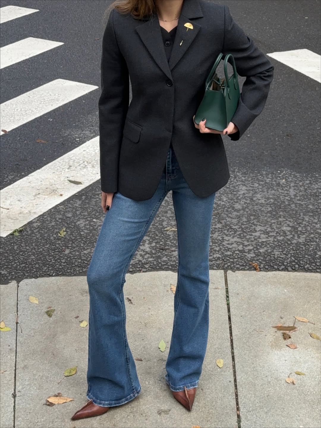 woman wearing winter denim outfit idea 2025