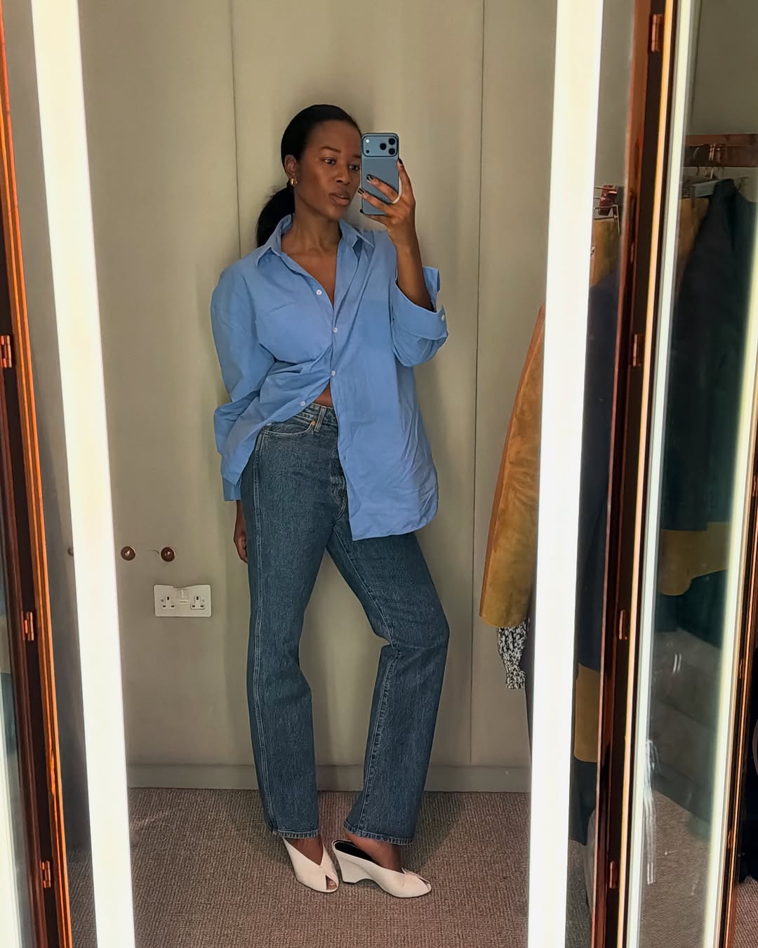 woman wearing heels with jeans spring outfit 2026