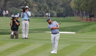 JJ Spaun hits from the centre of the fairway