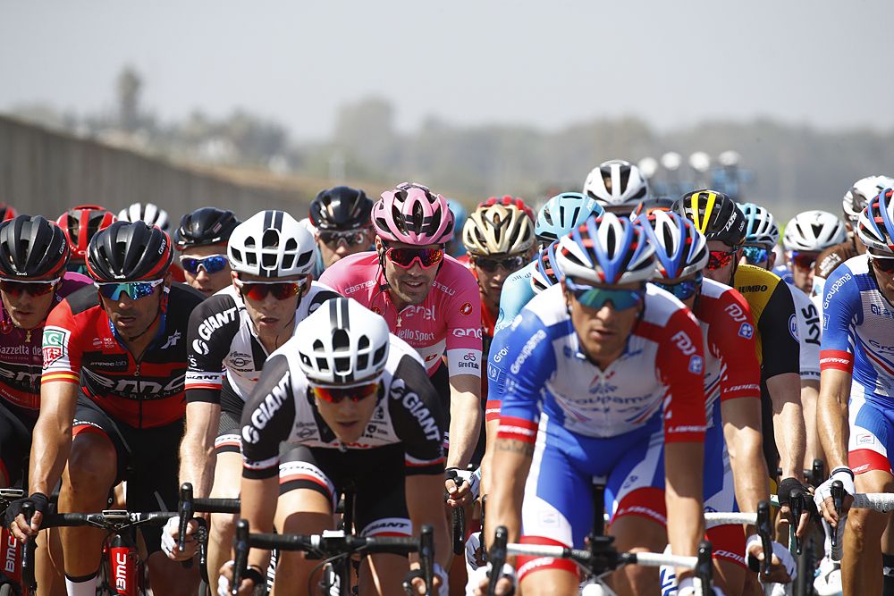 Tom Dumoulin sits in the field during stage 2 Giro d'Italia 2018