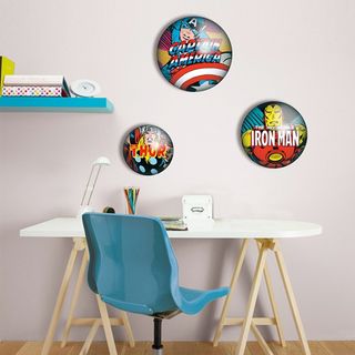 room with wooden flooring and marvel metal badges on wall and study table