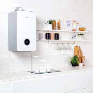 electric boiler with white wall and shelves
