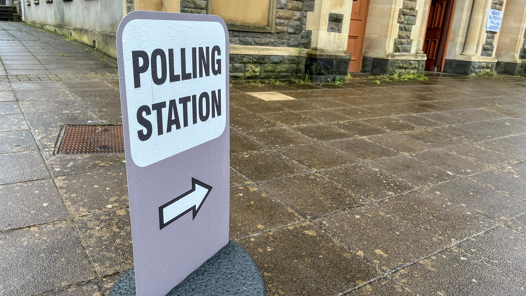 Polling Station sign on a pavement