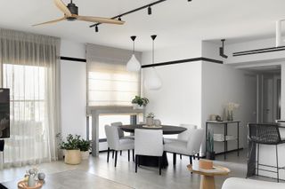 An open plan space with track lighting