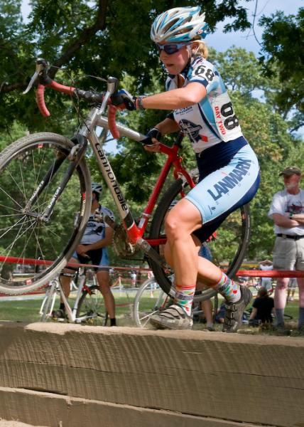 Kristine Church (Human Zoom) launches over the beam obstacle.