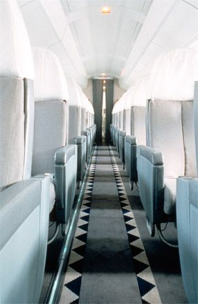 Putman was asked to revamp the interiors of the Concorde in 1994. She created an art deco frieze for the carpet, covered the seats in white fabric, and brought in softer lighting.