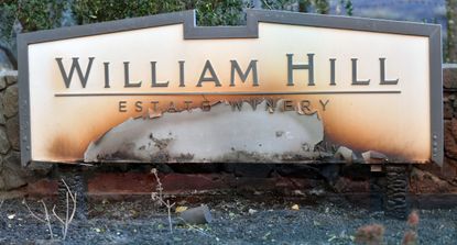 A California winery sign is scorched