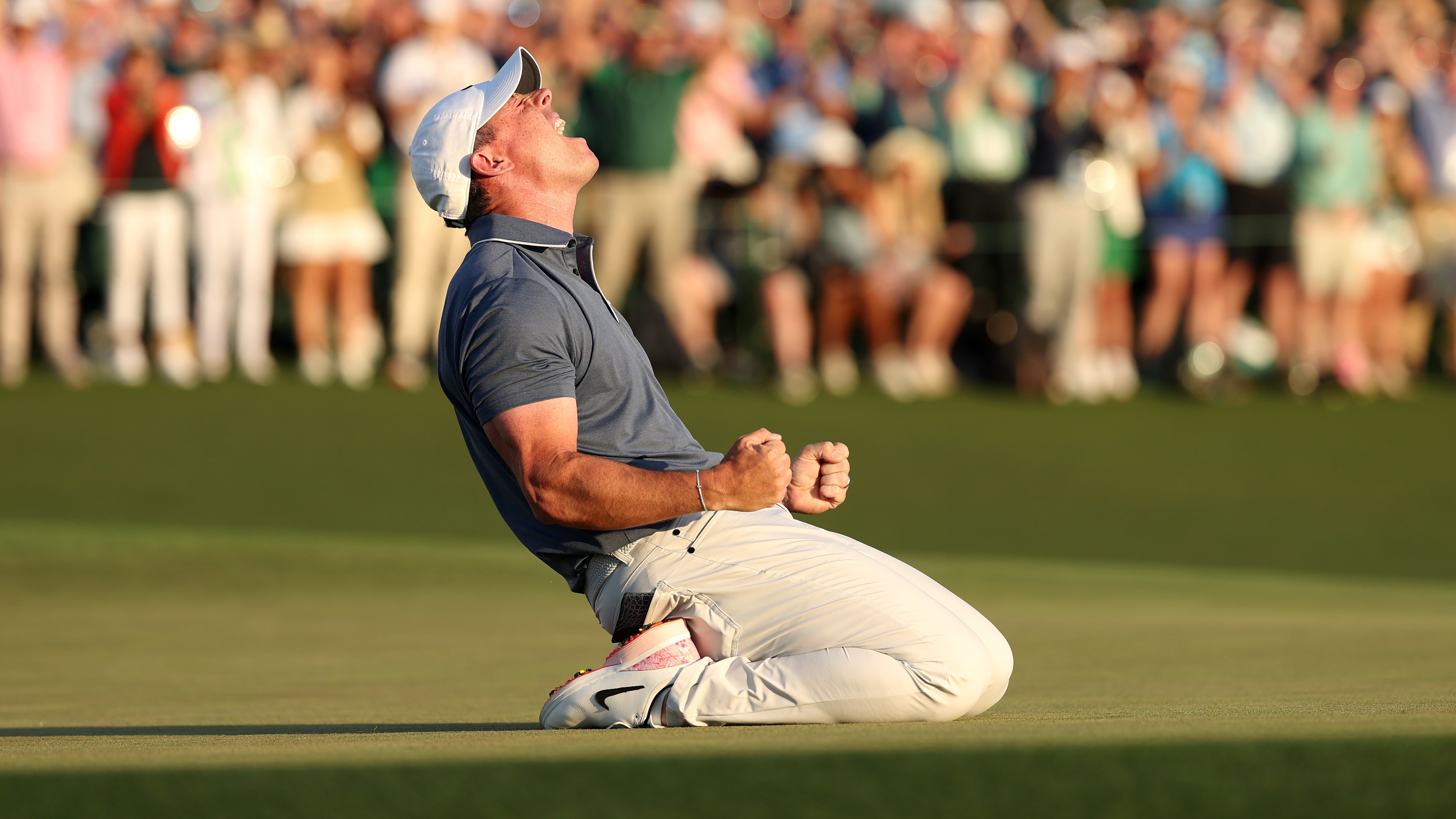 Rory McIlroy of Northern Ireland celebrates winning the 2025 Masters Tournament after the playoff hole on the 18th green during the final round of the 2025 Masters Tournament at Augusta National Golf Club on April 13, 2025 in Augusta, Georgia.