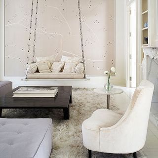 white living area with swing and carpet