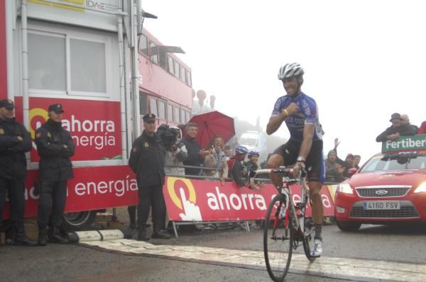 Caros Barredo (Quick Step) emerges from the mist to take victory.