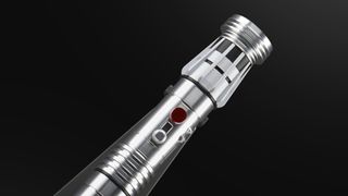 Star Wars Force FX Elite Maul lightsaber hilt against a dark background