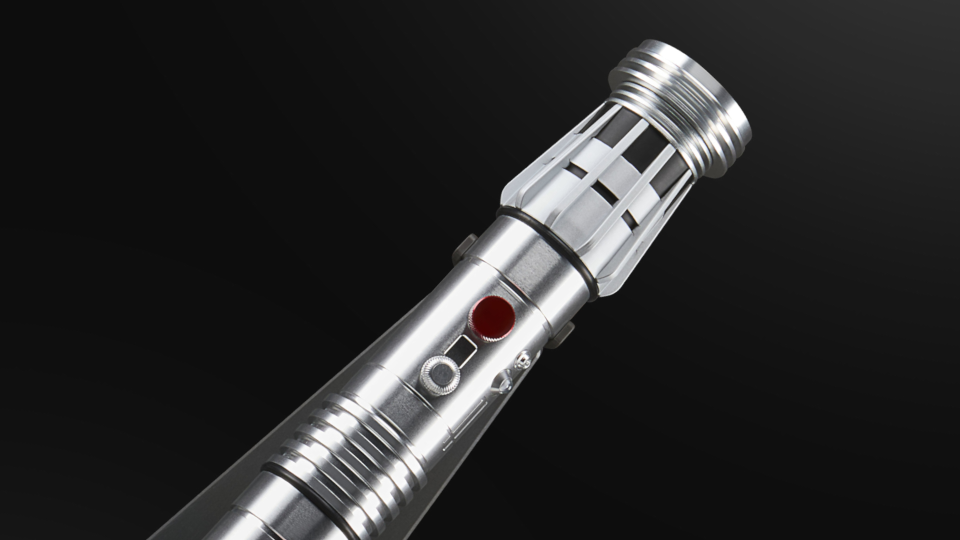 Star Wars Force FX Elite Maul lightsaber hilt against a dark background
