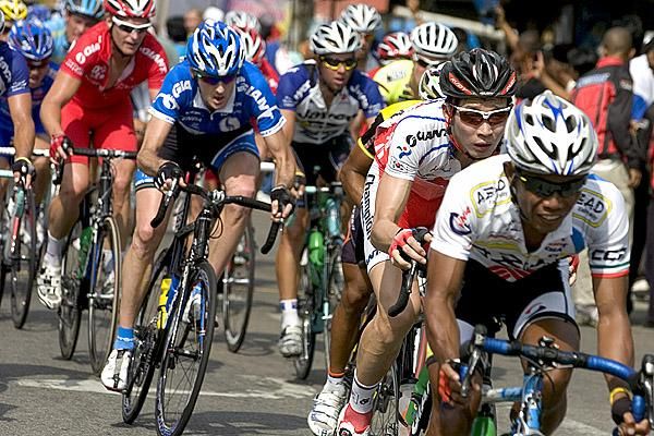 Riders charge towards an intermediate sprint during stage one of the 2010 Tour de Langkawi.