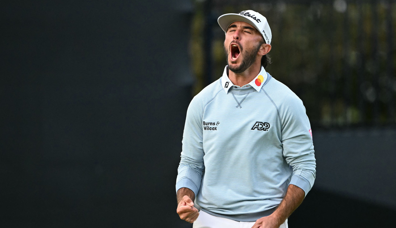 Max Homa screams in the air after holing his birdie putt