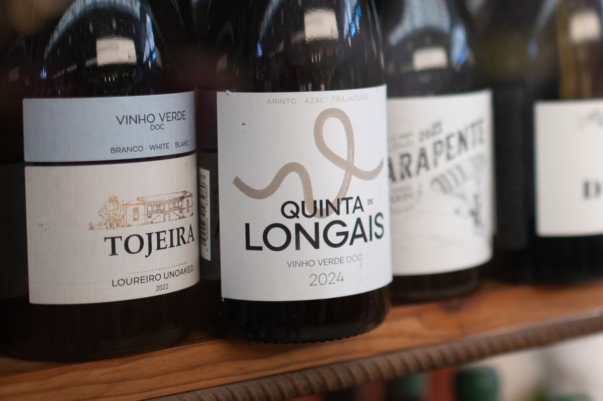 Sample images taken with Viltrox AF 35mm F1.4 Pro and Sigma 35mm f/1.4 DG HSM Art lenses; bottles of wine in a shop