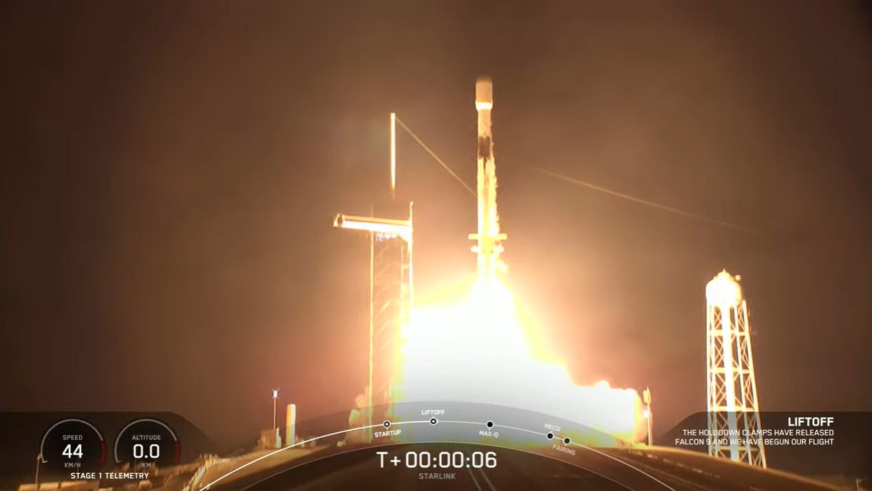 A veteran SpaceX Falcon 9 rocket launches 53 Starlink internet satellites to orbit from Pad 39A of NASA's Kennedy Space Center before dawn on May 6, 2022.