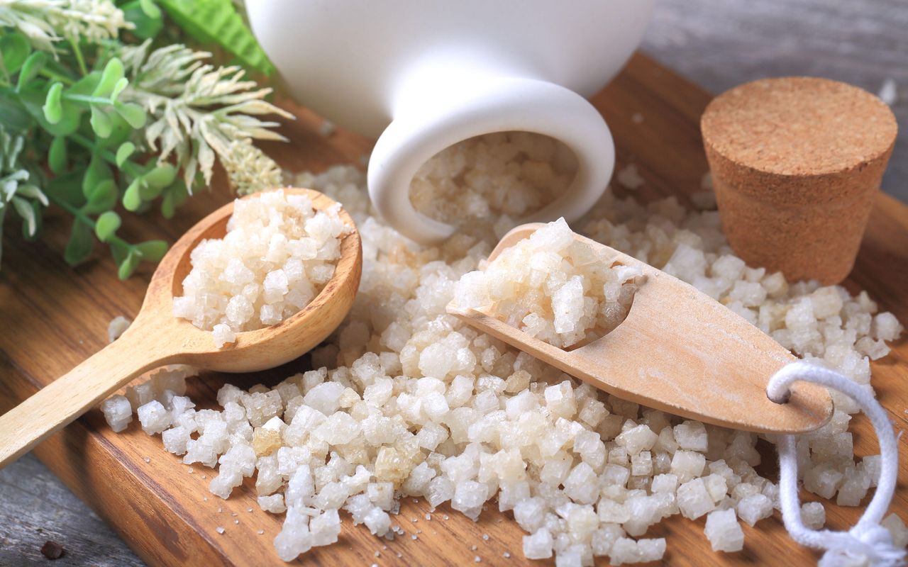 Epsom salts on a wooden background