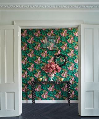 A hallway wallpaper idea with green and pink floral print