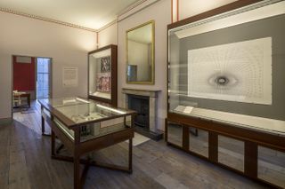 install view of architecture drawing prize artworks, shown in display cases at london museum