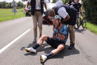 Astana Qazaqstan Teams British rider Mark Cavendish receives medical attention after crashing during the 8th stage of the 110th edition of the Tour de France cycling race 201 km between Libourne and Limoges in central western France on July 8 2023 Photo by Thomas SAMSON AFP Photo by THOMAS SAMSONAFP via Getty Images