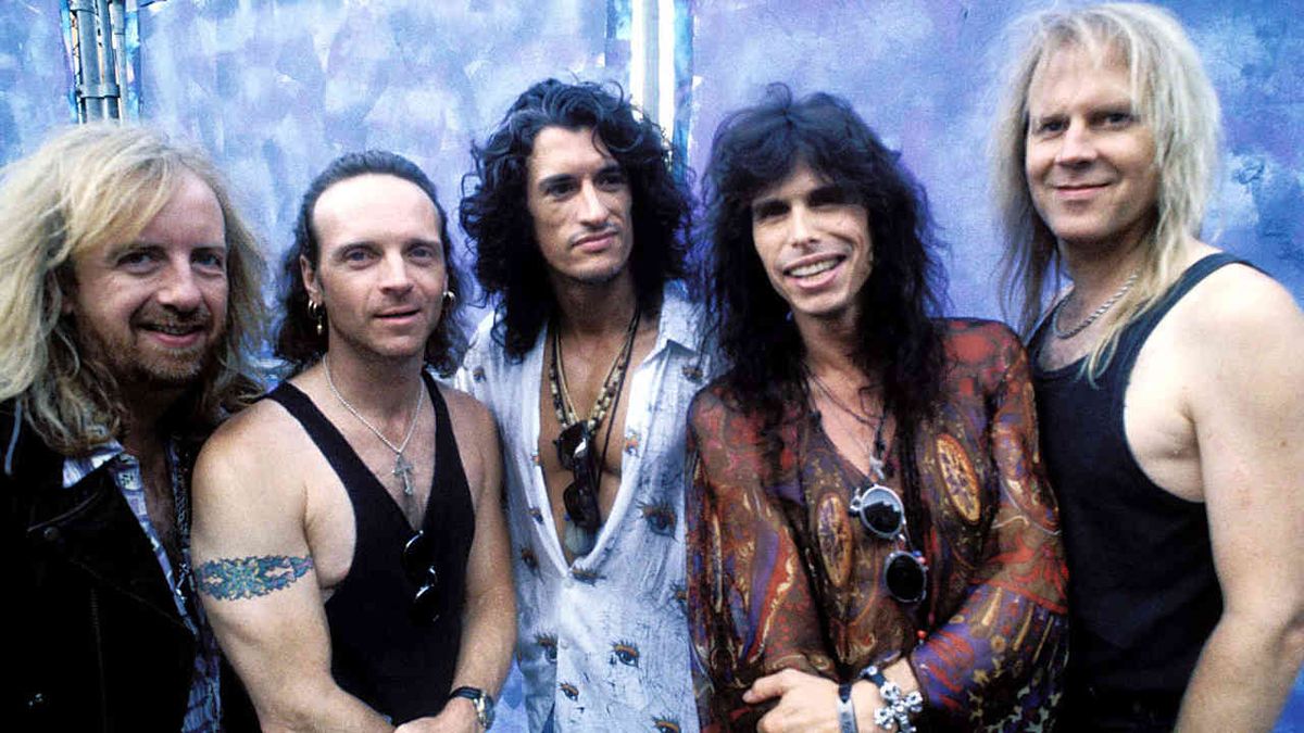 Aerosmith posing for a photograph in 1991