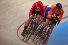 Elimination race winner Tobias Aagaard Hansen (Denmark) rides on the outside of Jan Willem van Schip (Netherlands) just prior to relegation of the Dutch rider