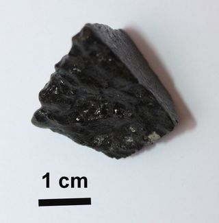 Tissint Meteorite Piece Covered With Fusion Crust