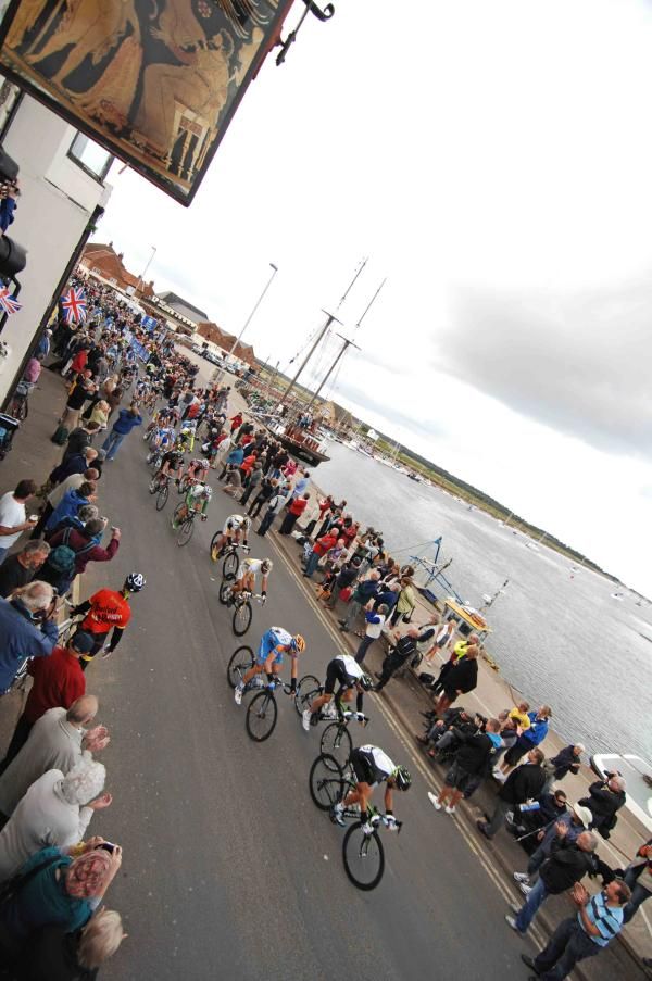 The peloton heads through this quaint seaside town.