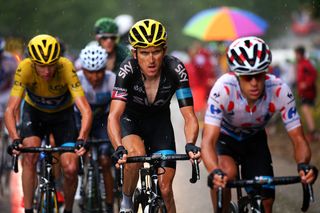 Richie Porte and Geraint Thomas lead Chris Froome.
