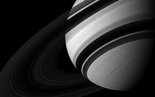 Dwarfed by Saturn