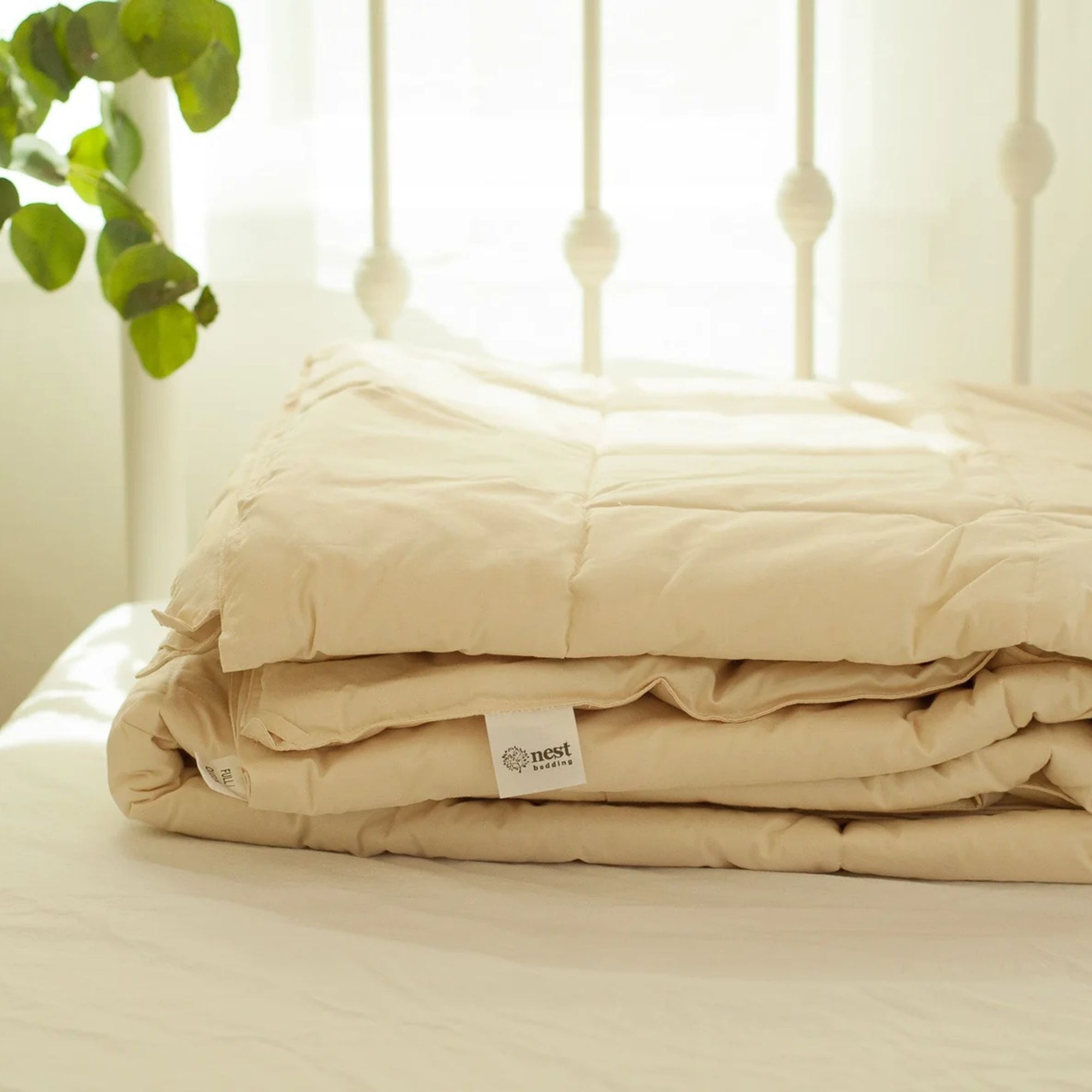 Nest Bedding Wool Duvet against a white background. 
