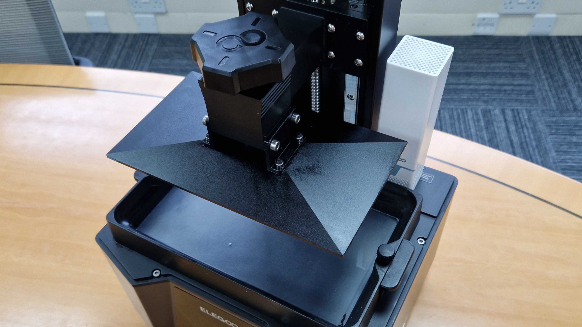 A top-down view of the Elegoo Saturn 3 Ultra 12K vat and build plate