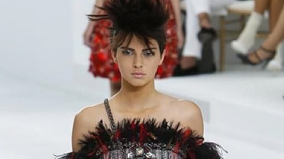 A model walks the runway during the Chanel Haute Couture show as part