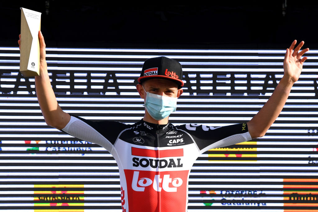 CALELLA SPAIN MARCH 22 Podium Andreas Lorentz Kron of Denmark and Team Lotto Soudal Celebration during the 100th Volta Ciclista a Catalunya 2021 Stage 1 a 1784km stage from Calella to Calella Mask Covid safety measures Trophy VoltaCatalunya100 on March 22 2021 in Calella Spain Photo by David RamosGetty Images
