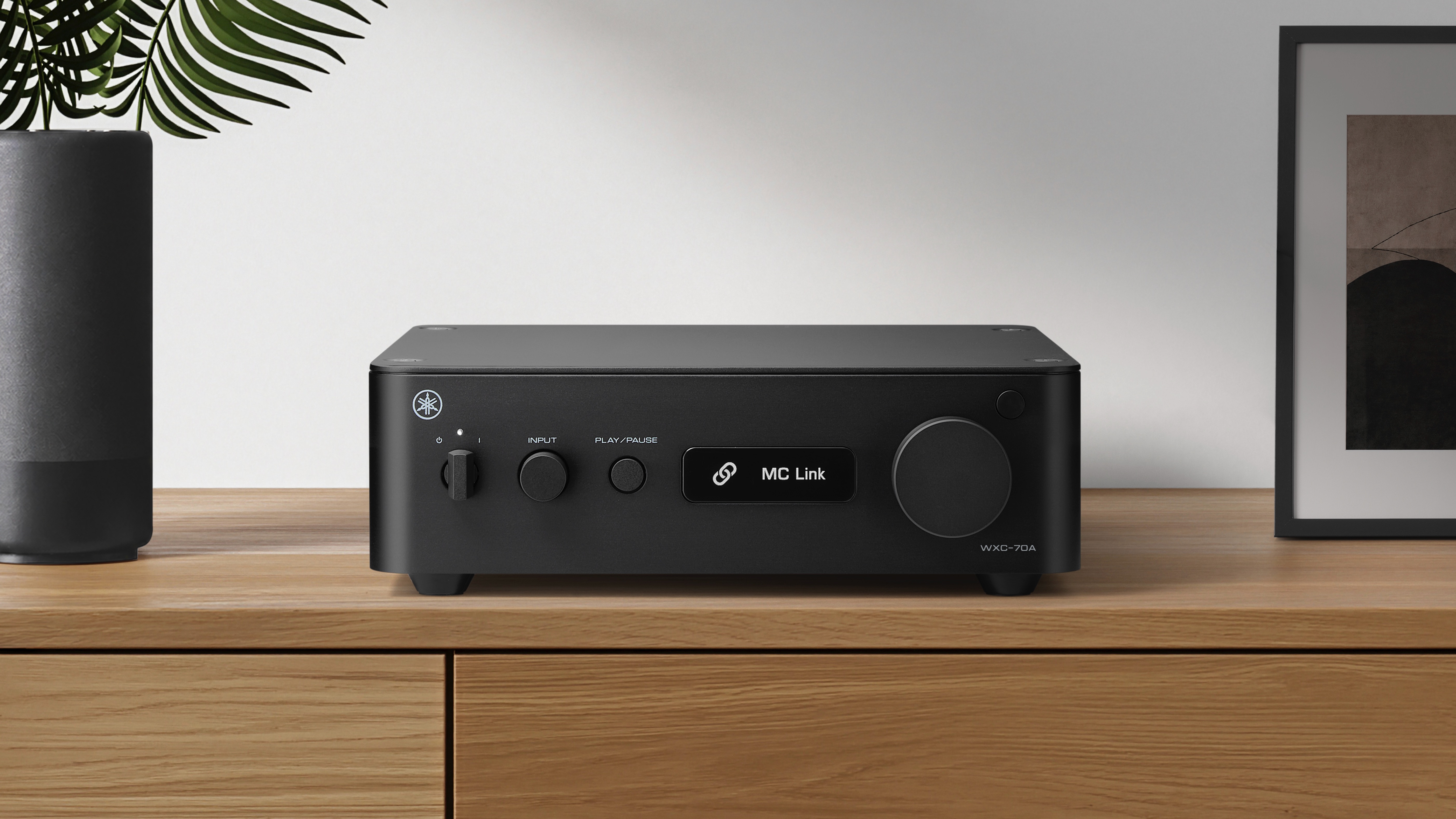 Yamaha WXC-70A network streamer on wooden shelf