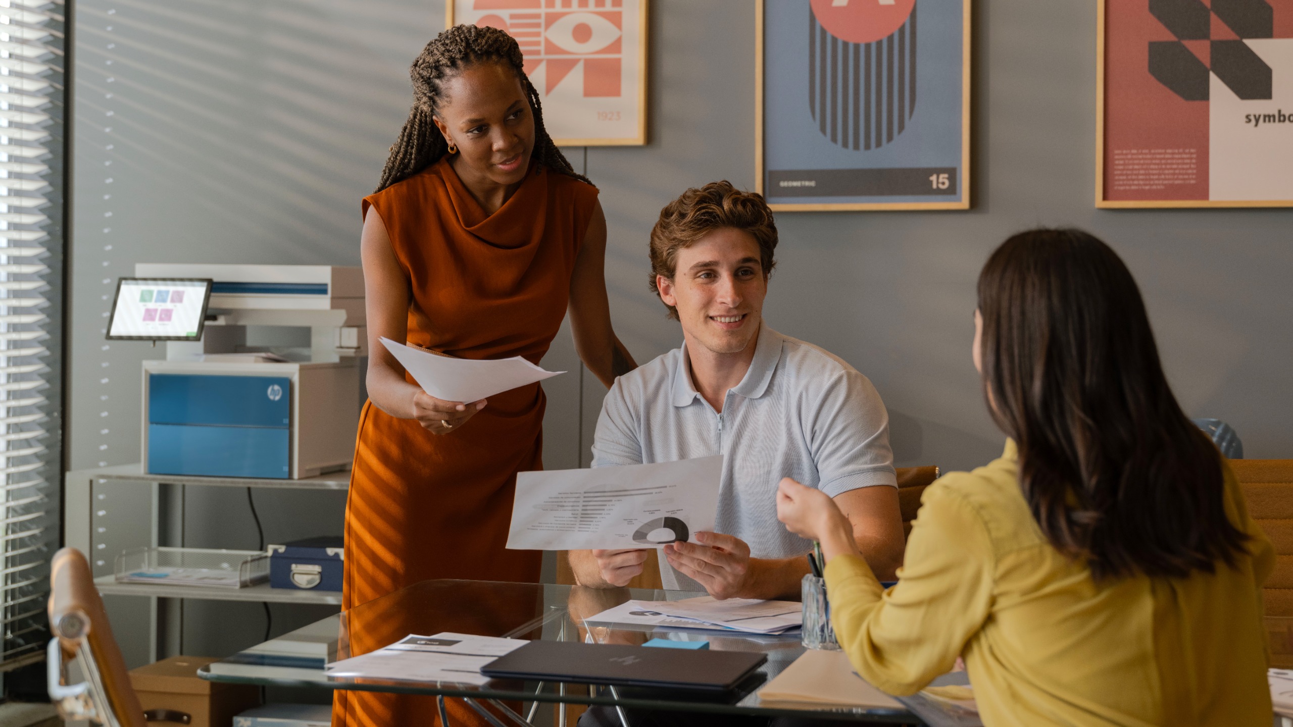People in office using printers 