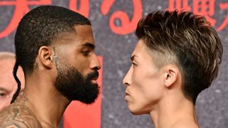 WBC and WBO super bantamweight champion Stephen Fulton (L) of the US and Japanese challenger Naoya Inoue face off during the official weigh-in at a hotel in Yokohama, Kanagawa prefecture on July 24, 2023, ahead of their title match at Tokyo's Ariake Arena on July 25
