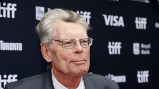 Stephen King smiling on the red carpet at TIFF 2024