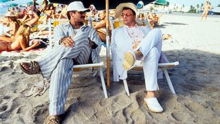 Robin Williams and Nathan Lane in beach chairs in the movie Birdcage