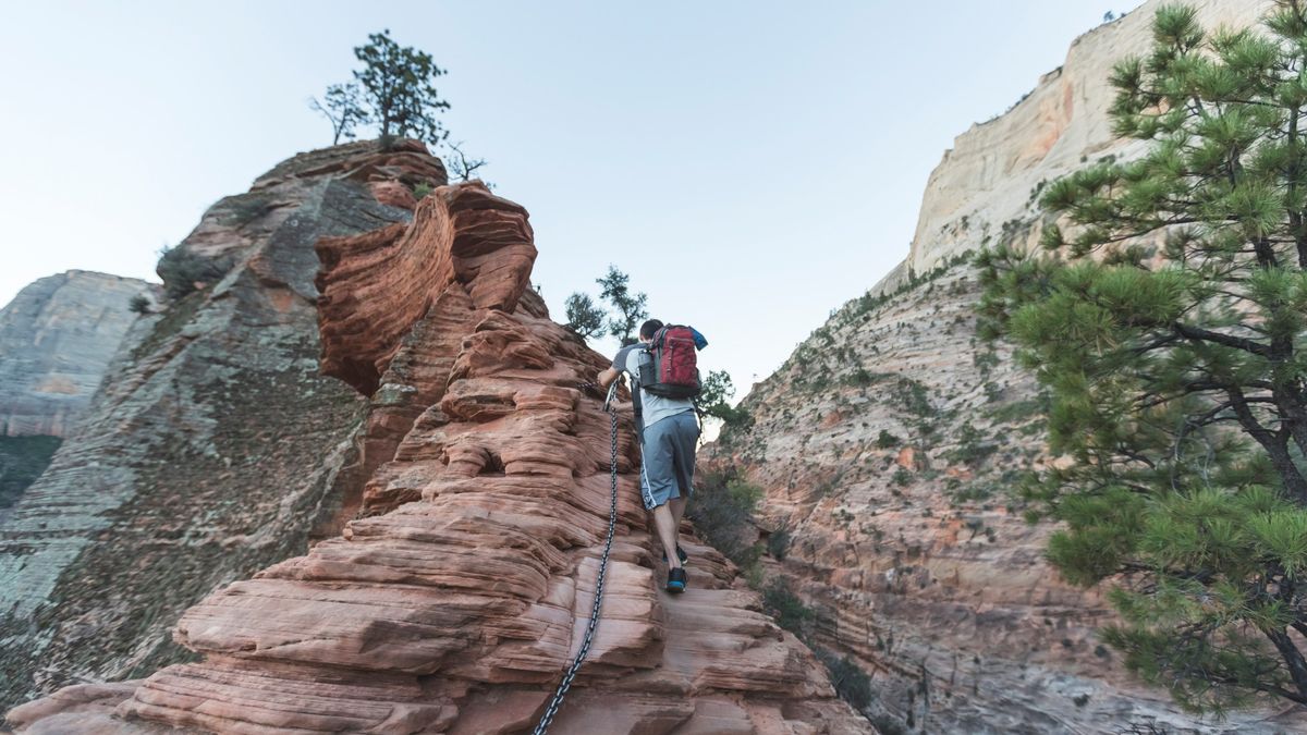 Man hiking up Angels Landing trail