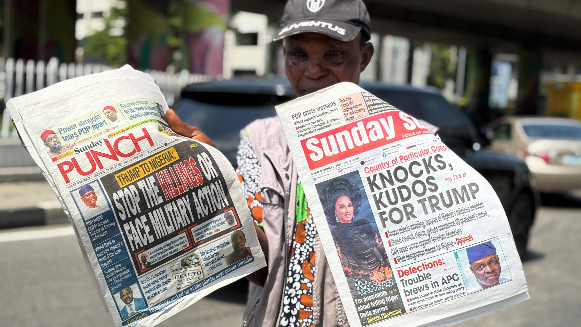 Newspaper vendor in Lagos, Nigeria