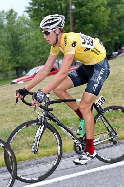Roman Van Uden (Pure Black Racing) riding in the bunch.