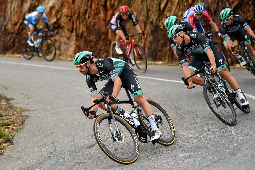 CIUDADRODRIGO SPAIN NOVEMBER 06 Michael Schwarzmann of Germany and Team BORA Hansgrohe Pascal Ackermann of Germany and Team BORA Hansgrohe during the 75th Tour of Spain 2020 Stage 16 a 162km stage from Salamanca to Ciudad Rodrigo lavuelta LaVuelta20 La Vuelta on November 06 2020 in Ciudad Rodrigo Spain Photo by David RamosGetty Images