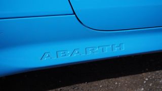 The Abarth 500e Turismo in Poison Blue