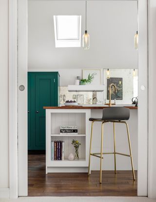 A ground floor extension gave Julie and James the chance to create their dream kitchen, with a vaulted ceiling and bold but sophisticated Shaker-style units