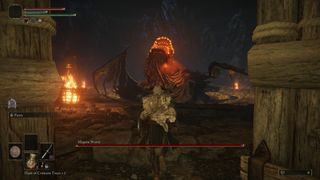 Elden Ring - a player runs into the Magma Wyrm boss fight in Gael Tunnel while the wyrm prepares to breathe fire.