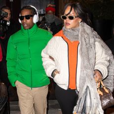 Rihanna was spotted with A$AP Rocky wearing an oversize cardigan with leggings and a Louis Vuitton bag