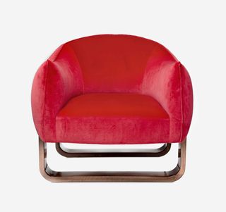 Red velvet upholstered armchair by Marie Burgos