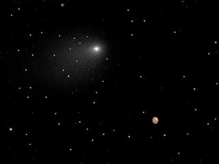 Hubble Views Comet Siding Spring and Mars