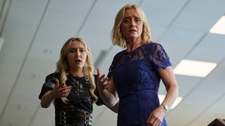 Rose Ayling-Ellis in a black dress as Miri and Anne-Marie Duff in a blue dress as Christine look shocked in Reunion.